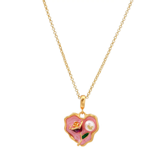 Heart-shaped pendant with pink enamel, rose design, freshwater pearl flower, and gold scalloped frame on delicate chain