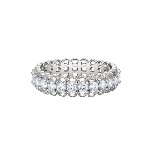 Sterling silver eternity ring with continuous row of brilliant moissanite stones in scalloped crown setting with milgrain detail